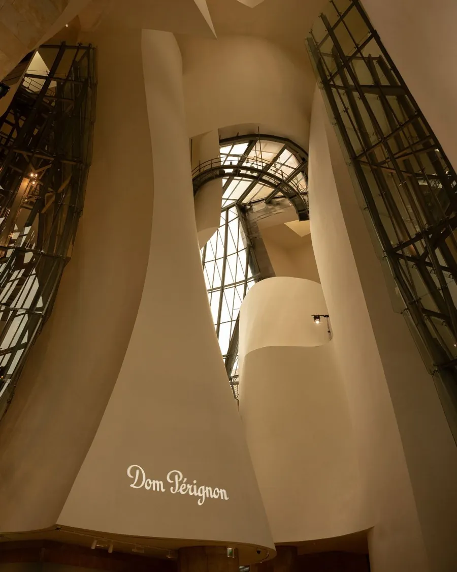 Dom Pérignon lettering on a curved white wall at Révélations 2026